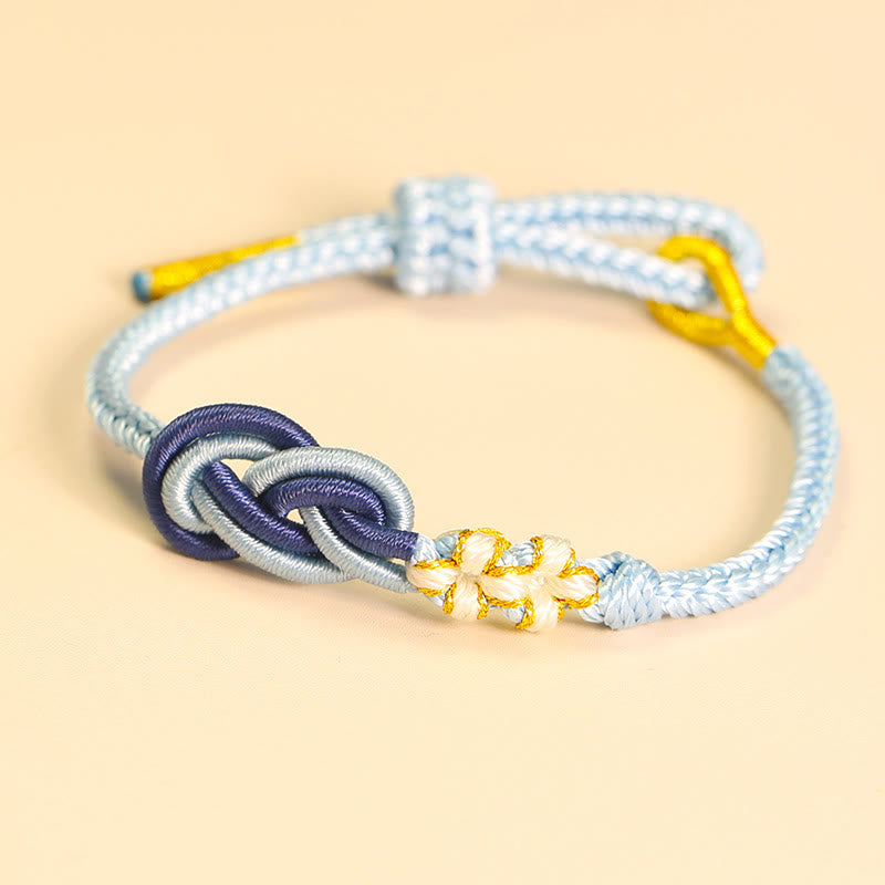 Handgefertigtes Peace-Knoten-Armband mit acht Fäden und roter Schnur
