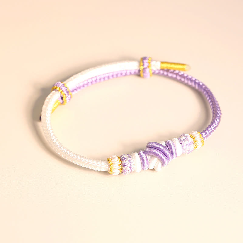 Handgefertigtes zweifarbiges Peace Knot-Armband aus roter Schnur