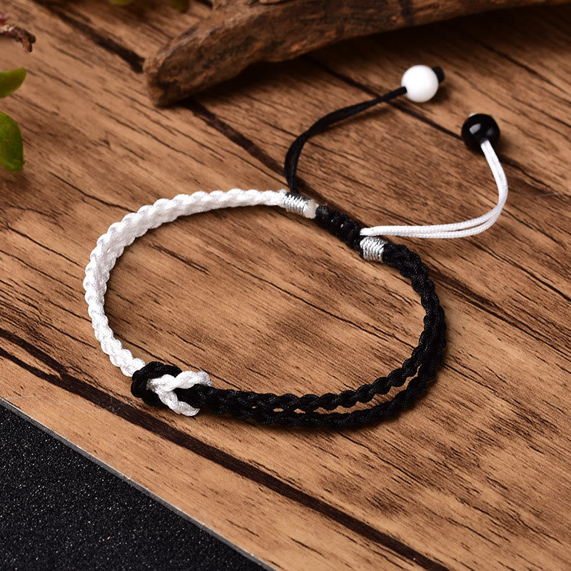 Handgemachtes schwarz-weißes Seil geflochtenes rotes Schnurarmband zum Schutz