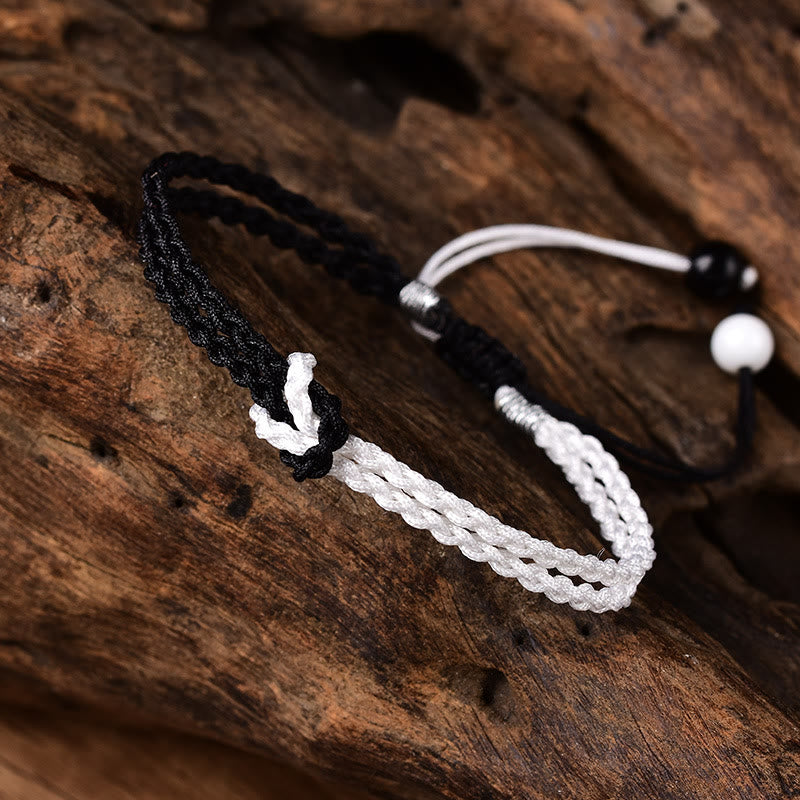 Handgemachtes schwarz-weißes Seil geflochtenes rotes Schnurarmband zum Schutz