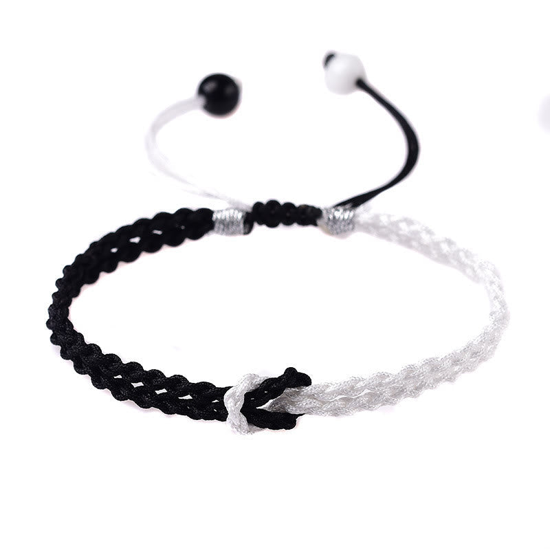 Handgemachtes schwarz-weißes Seil geflochtenes rotes Schnurarmband zum Schutz