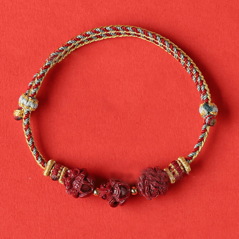 Handgefertigtes chinesisches Sternzeichen-Armband aus Zinnober mit dunkelrotem Segensband