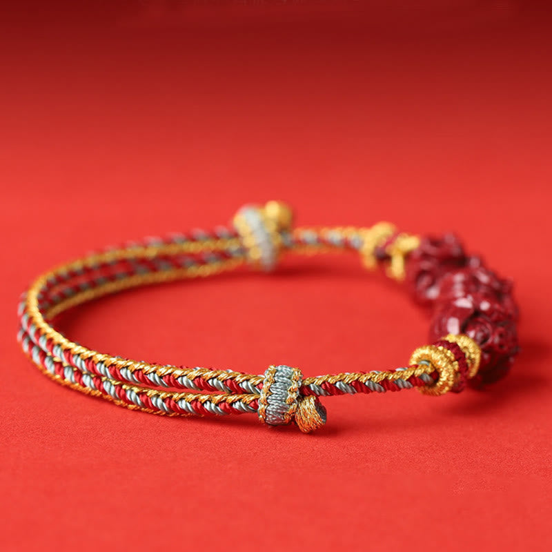 Handgefertigtes chinesisches Sternzeichen-Armband aus Zinnober mit dunkelrotem Segensband
