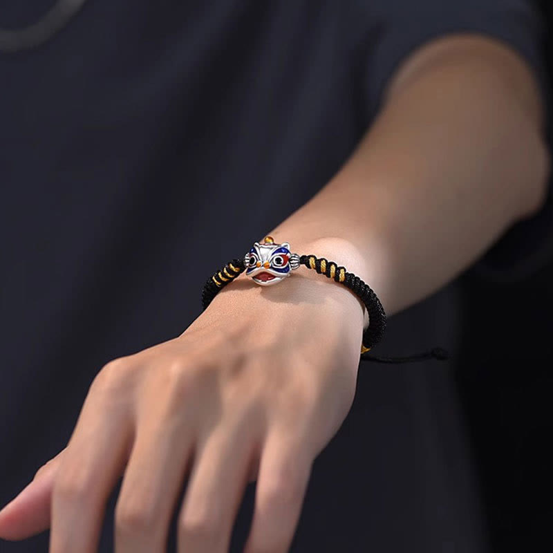Handgemachtes tanzendes Löwenarmband mit roter Schnur zum Schutz