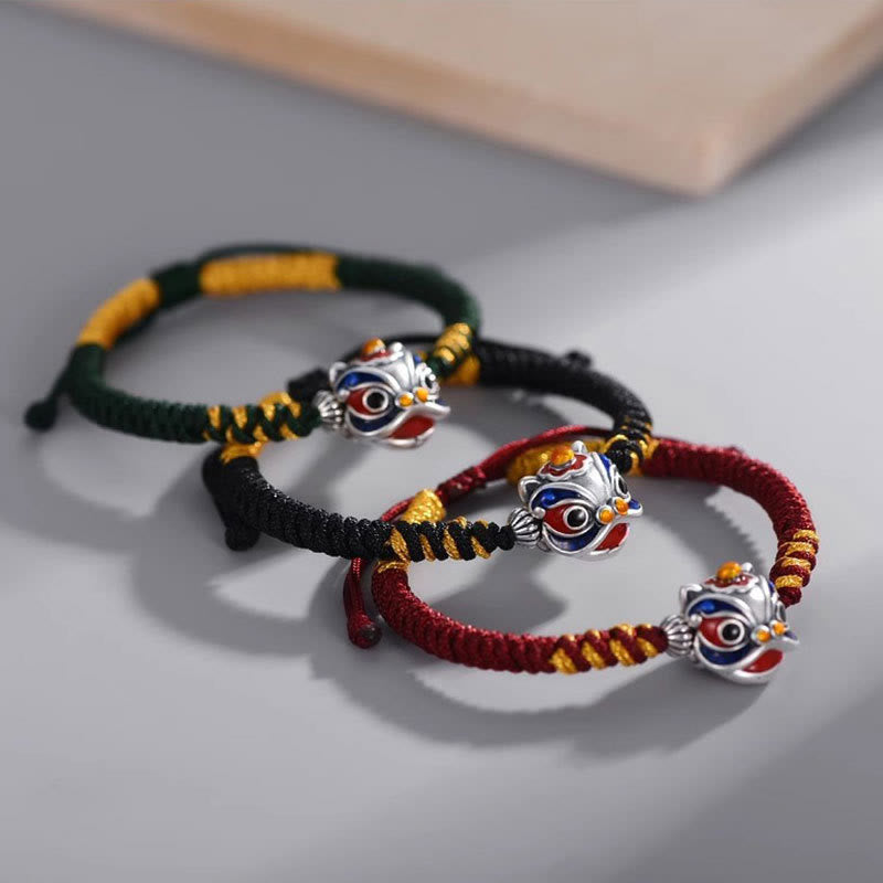 Handgemachtes tanzendes Löwenarmband mit roter Schnur zum Schutz