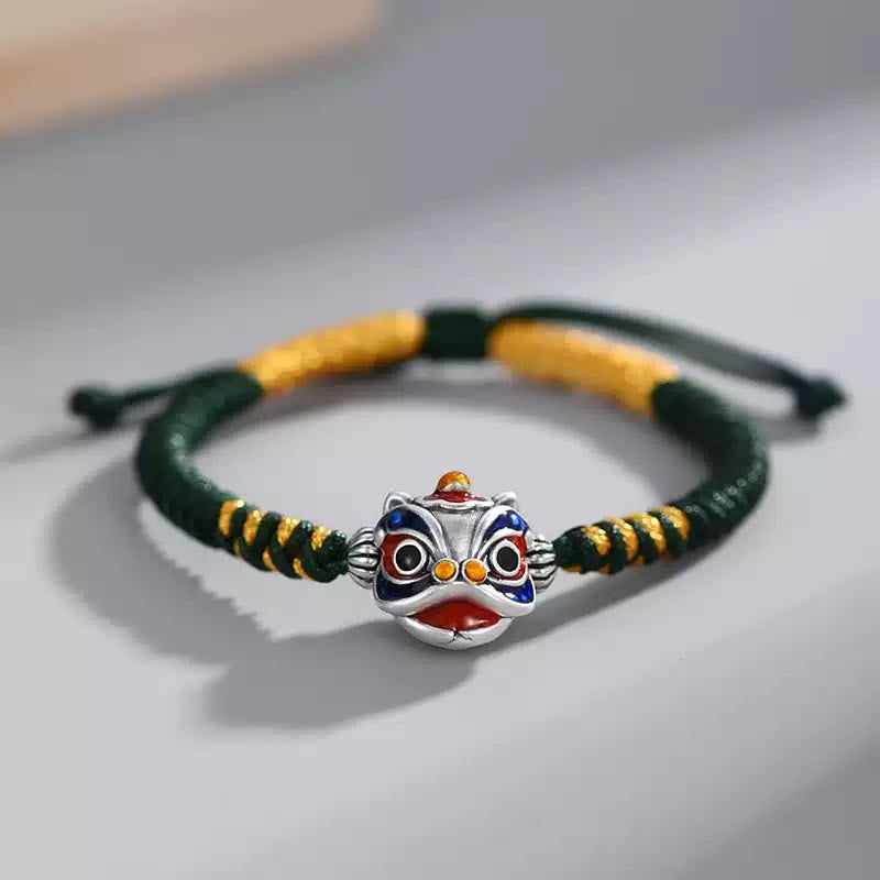 Handgemachtes tanzendes Löwenarmband mit roter Schnur zum Schutz