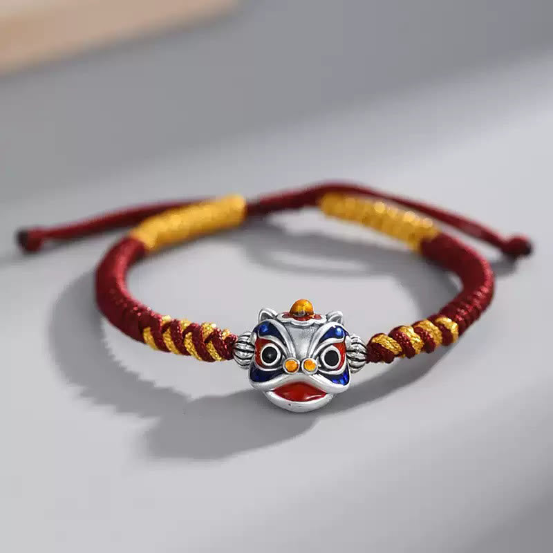 Handgemachtes tanzendes Löwenarmband mit roter Schnur zum Schutz