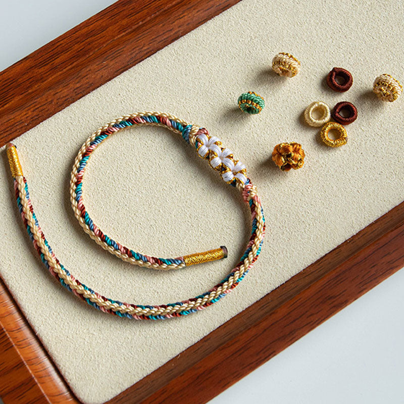 Handgemachtes Dunhuang Pfirsichblütenmuster Rotes Schnurarmband
