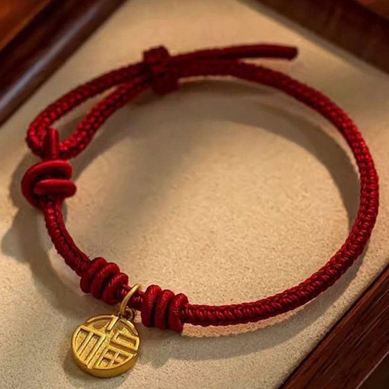Handgefertigtes rotes Armband mit acht Fäden für Glück und Schutz