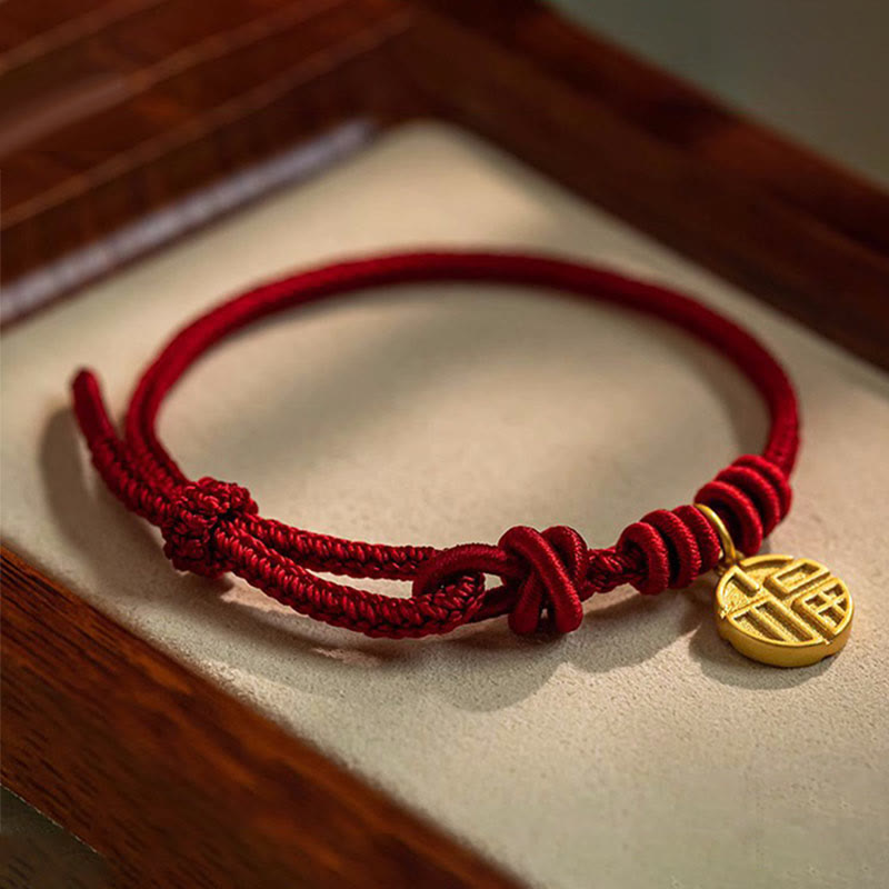 Handgefertigtes rotes Armband mit acht Fäden für Glück und Schutz