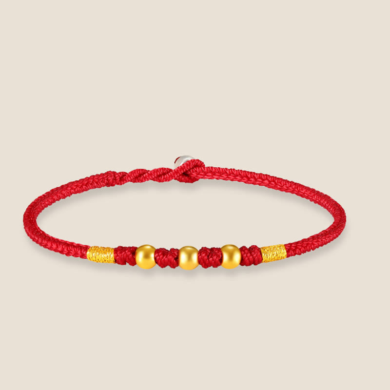 Handgefertigtes rotes Schnurarmband mit 999 Goldperlen und King Kong-Knoten zum Schutz