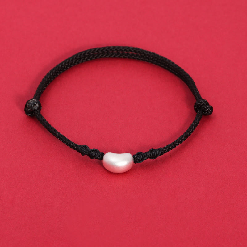 Handgemachtes rotes Schnurarmband 999 Sterling Silber Glückssymbol