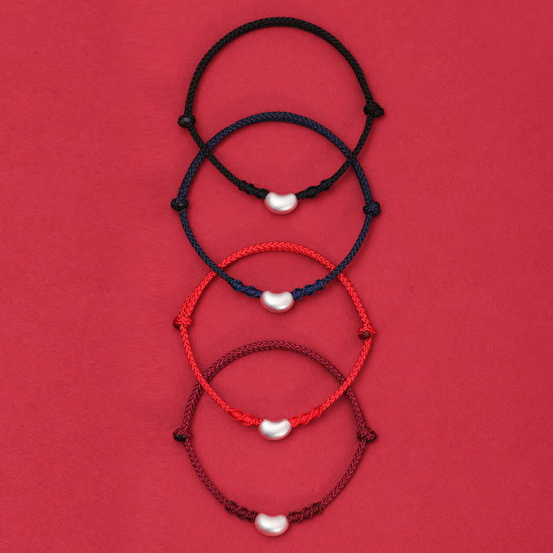 Handgemachtes rotes Schnurarmband 999 Sterling Silber Glückssymbol