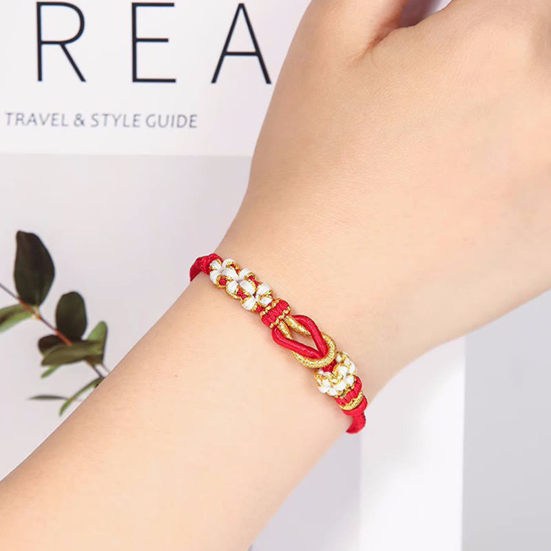 Handgemachtes rotes Schnurarmband mit acht Fäden, Friedensknoten, Schutz
