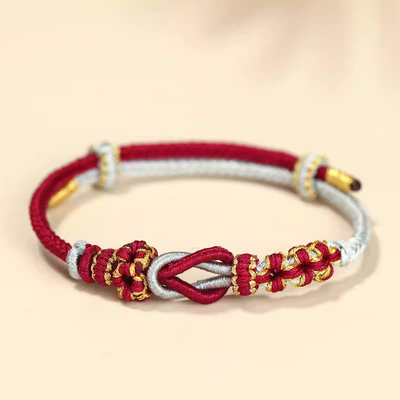 Handgemachtes rotes Schnurarmband mit acht Fäden, Friedensknoten, Schutz