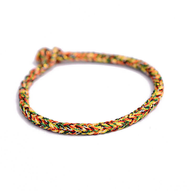 Handgemachtes rotes Armband mit acht Fäden und Friedensknoten