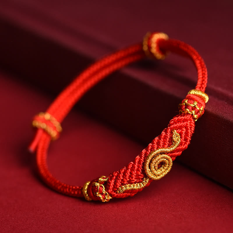 Handgemachtes rotes Armband mit acht Fäden, Friedensknoten und Schlangenjahr