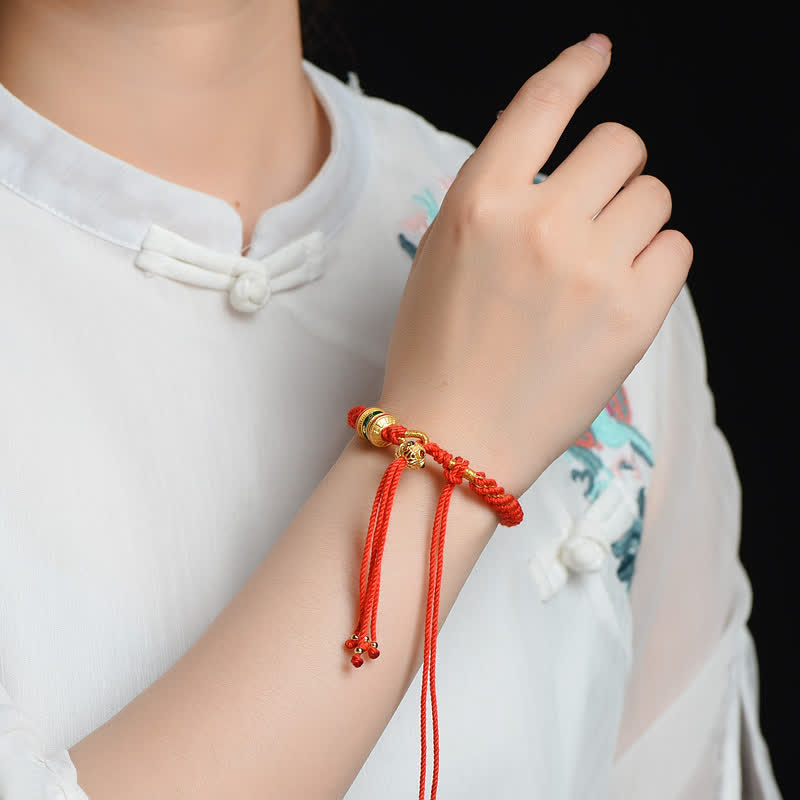 Handgemachtes tibetisches Gebetsrad-Armband mit roter Schnur zum Glück