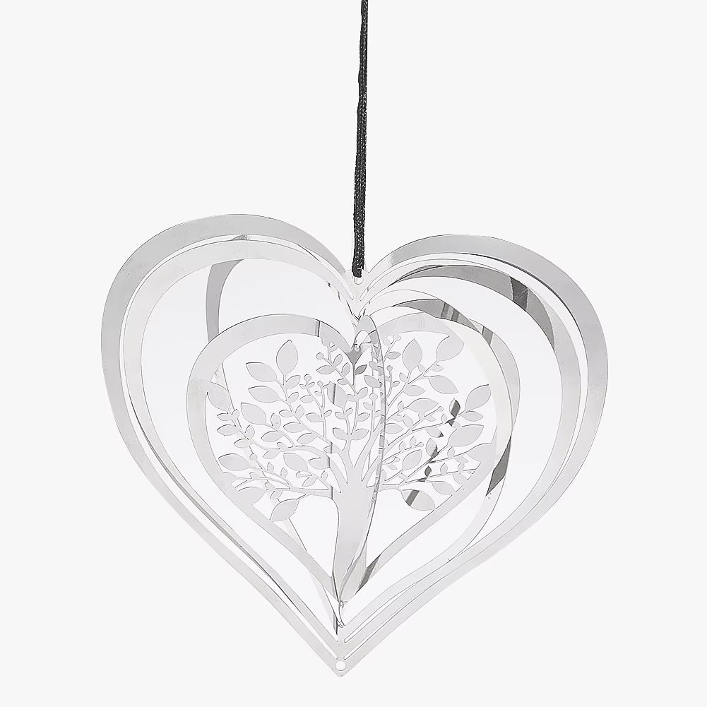 White heart-shaped ornament with tree design in Heart Tree of Life Kinetic Metal Wind Spinner