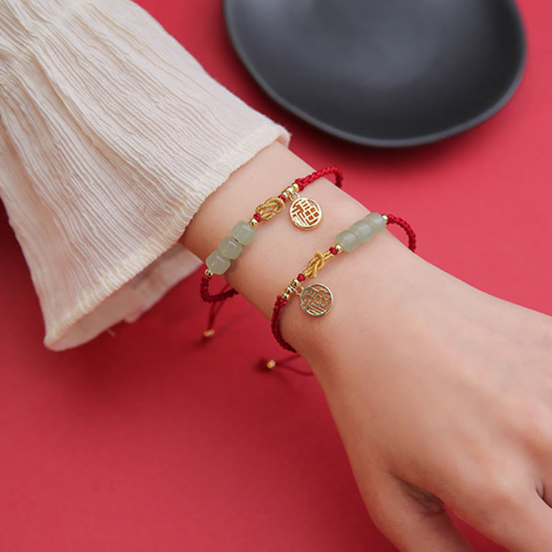 Jadeperlenarmband mit Fu-Anhänger an rotem Seil für Glück und Wohlstand