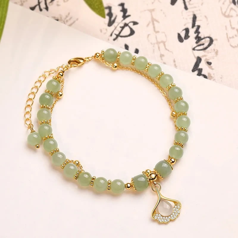 Jade-Glücksperlenarmband mit Blatt-, Tulpen- und Fu-Symbol