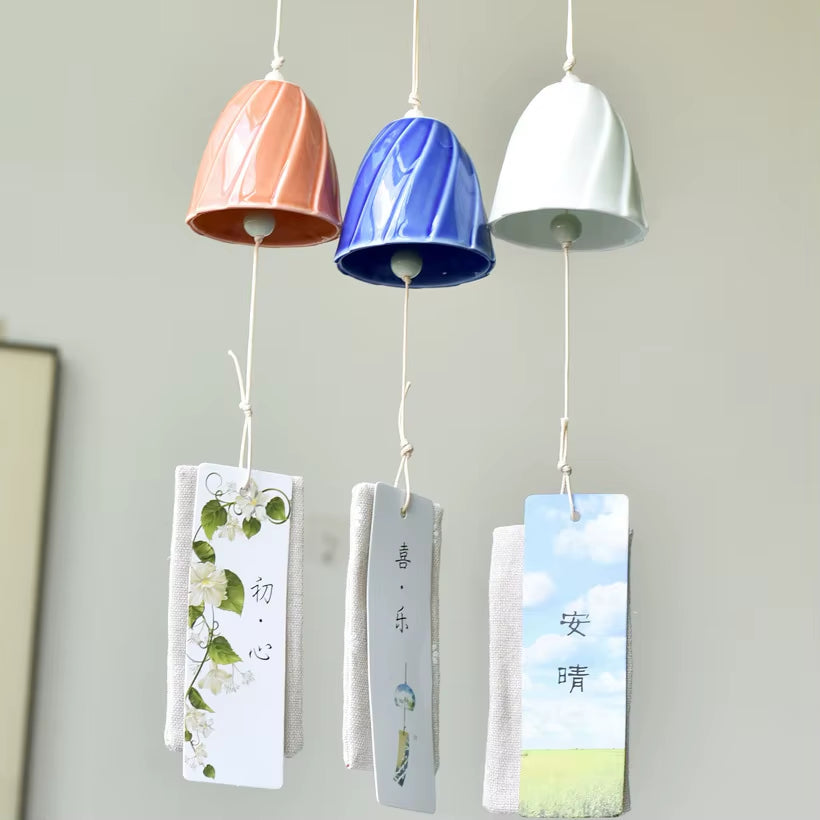 Three Japanese Ceramic Wind Chimes in peach, blue, and white for outdoor decor