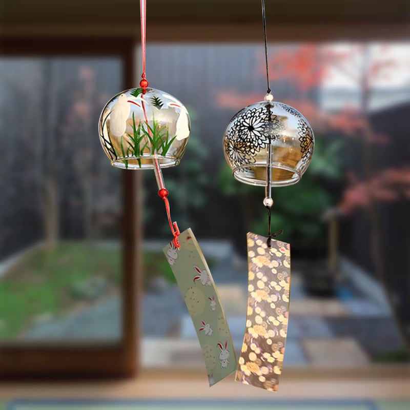 Two Japanese Glass Wind Chimes with decorative bells and hanging ornaments for outdoor decor