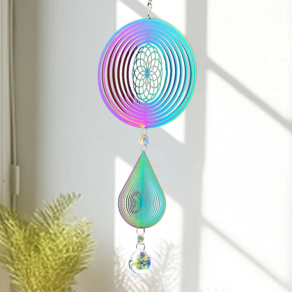 Iridescent metal wind spinner featuring crystal pendant suncatcher design