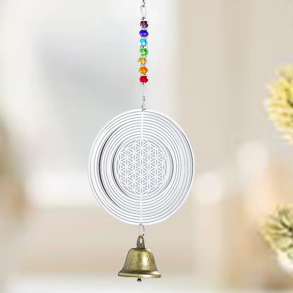 Circular metal wind spinner with rainbow chakra beads and brass bell for garden decor