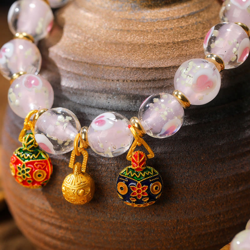 Leuchtendes rosa Liebesherz-Spiritual-Armband mit goldenem Schlucktier