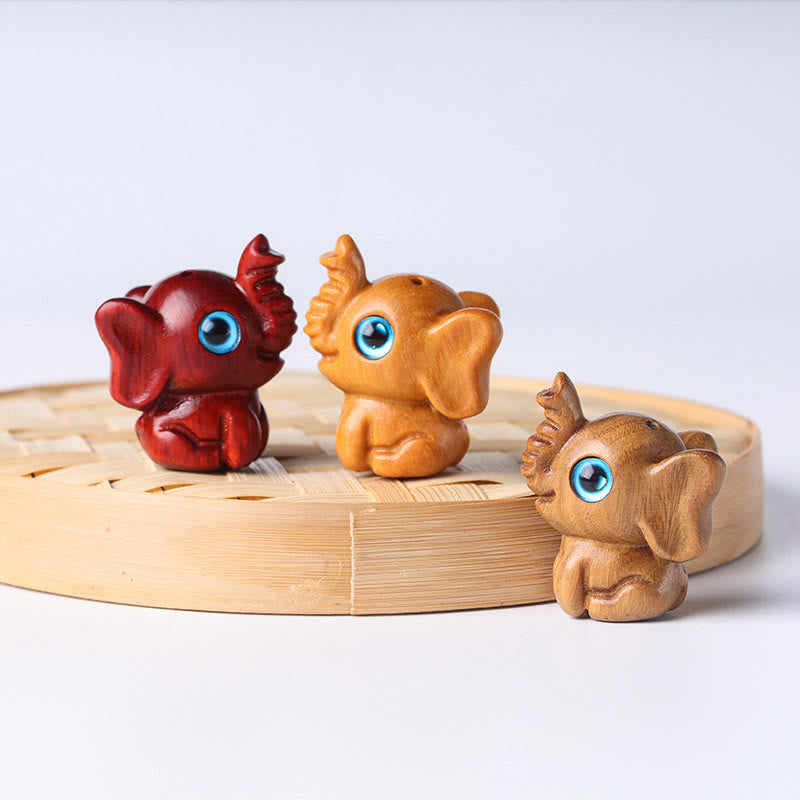 Geschnitzte Mini-Elefanten-Dekoration aus Sandelholz für Schutz und Glück