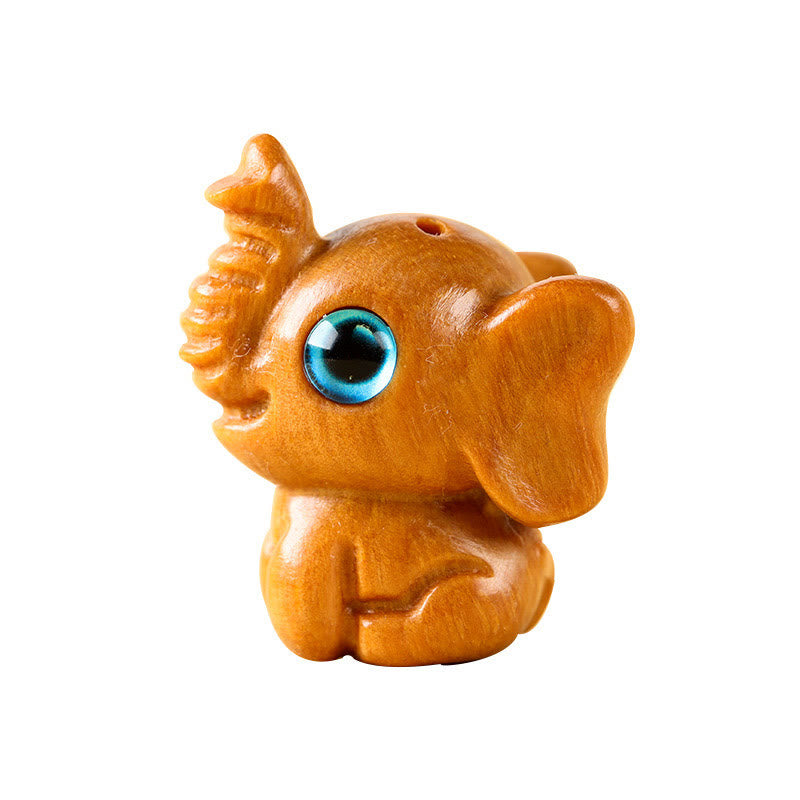 Geschnitzte Mini-Elefanten-Dekoration aus Sandelholz für Schutz und Glück