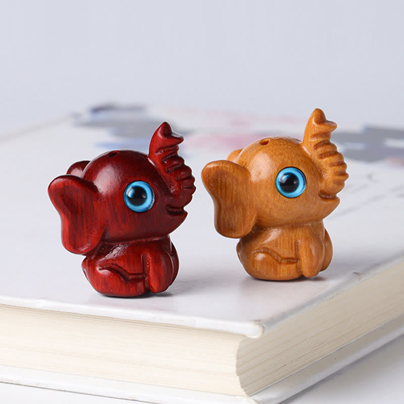 Geschnitzte Mini-Elefanten-Dekoration aus Sandelholz für Schutz und Glück