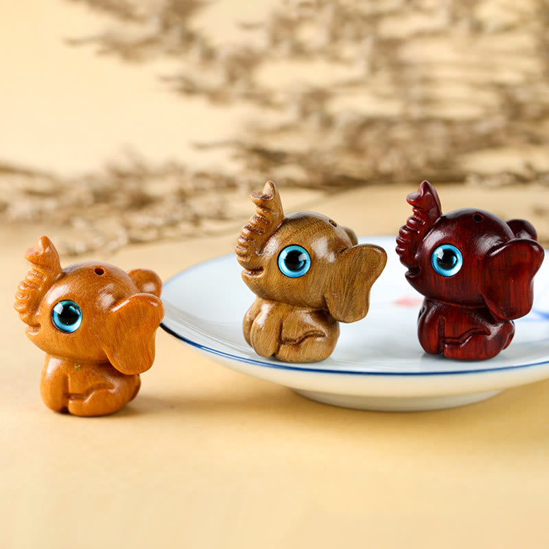 Geschnitzte Mini-Elefanten-Dekoration aus Sandelholz für Schutz und Glück