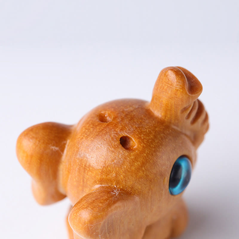 Geschnitzte Mini-Elefanten-Dekoration aus Sandelholz für Schutz und Glück