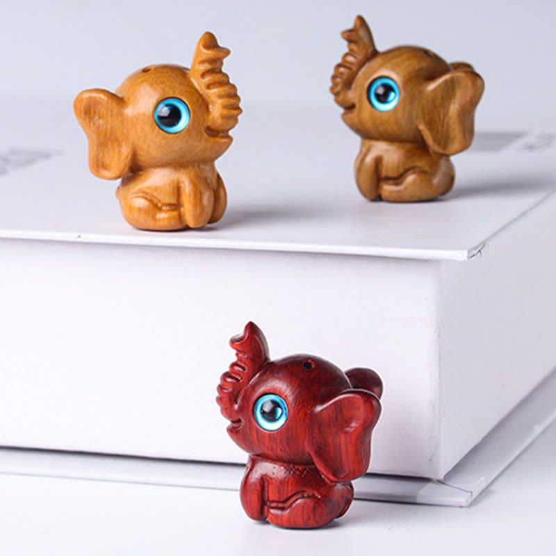Geschnitzte Mini-Elefanten-Dekoration aus Sandelholz für Schutz und Glück