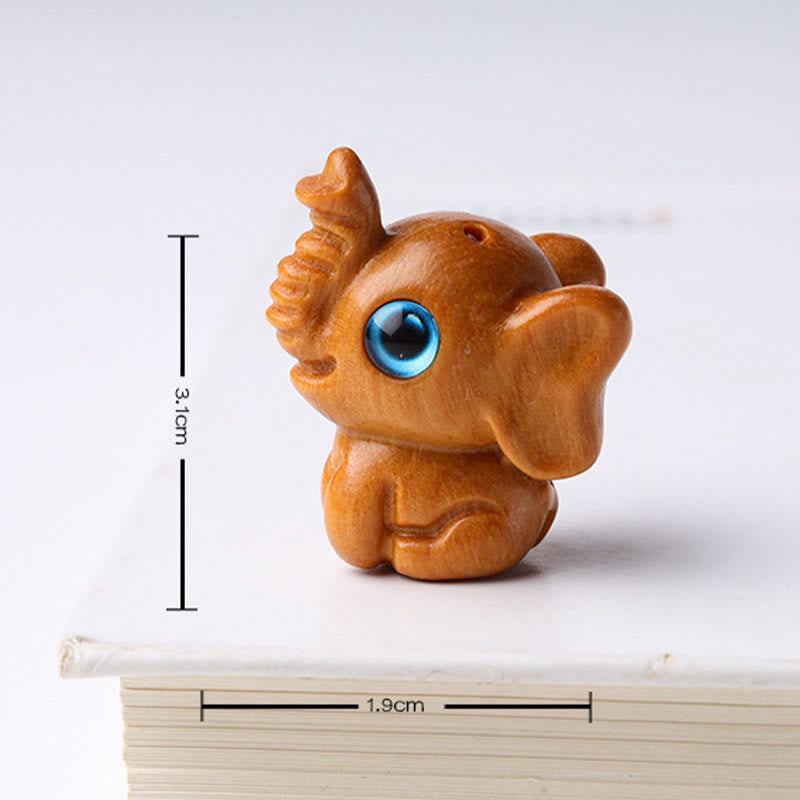 Geschnitzte Mini-Elefanten-Dekoration aus Sandelholz für Schutz und Glück