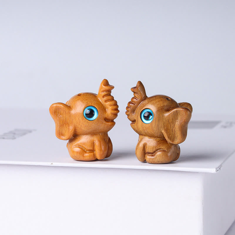 Geschnitzte Mini-Elefanten-Dekoration aus Sandelholz für Schutz und Glück