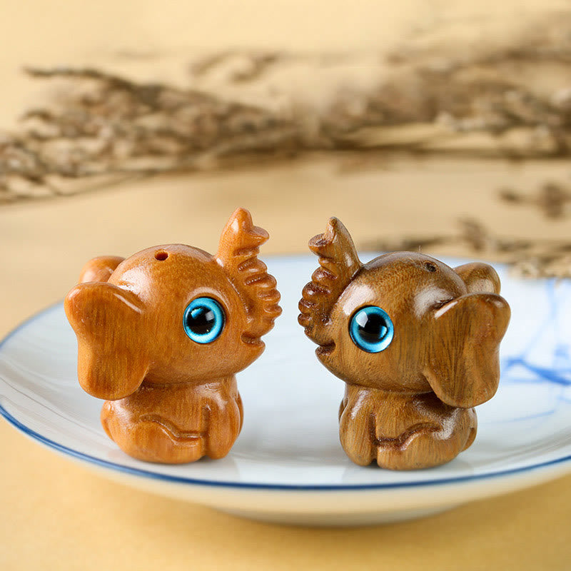 Geschnitzte Mini-Elefanten-Dekoration aus Sandelholz für Schutz und Glück