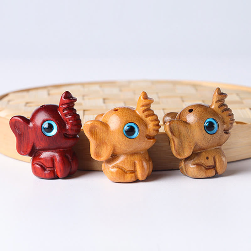 Geschnitzte Mini-Elefanten-Dekoration aus Sandelholz für Schutz und Glück