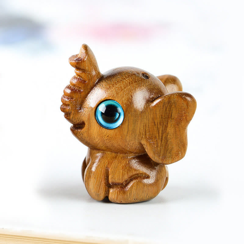 Geschnitzte Mini-Elefanten-Dekoration aus Sandelholz für Schutz und Glück