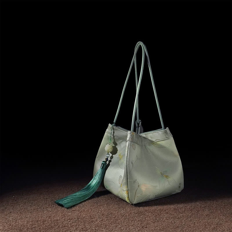 Spirituelle Schultertasche aus bestickter Maulbeerseide und Xiangyunsha-Seide