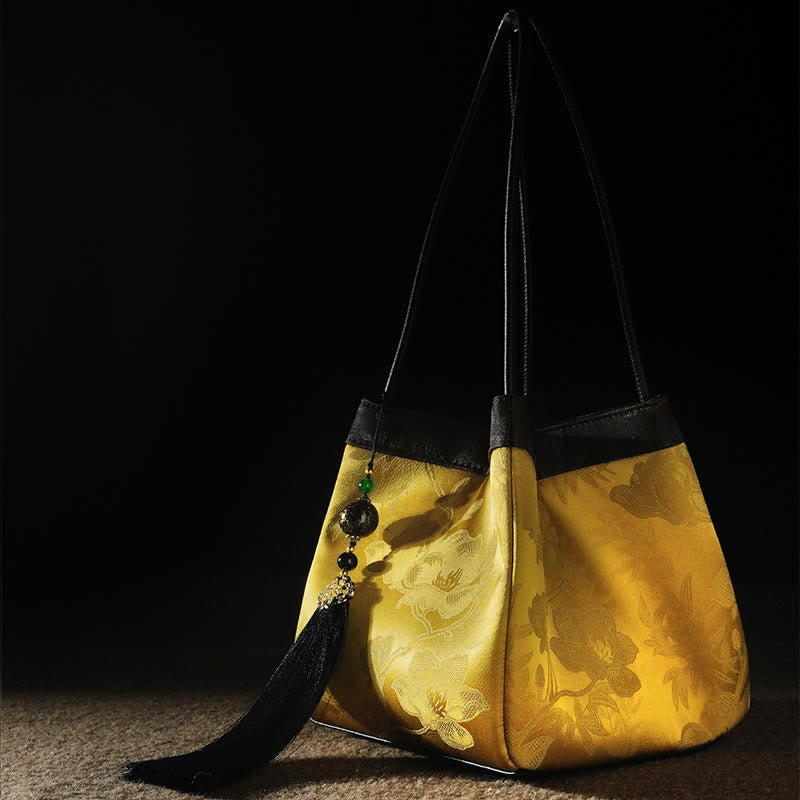 Spirituelle Schultertasche aus bestickter Maulbeerseide und Xiangyunsha-Seide