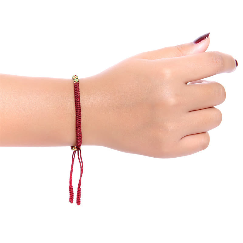 Mehrfarbiges tibetisches King Kong Knoten-Armband mit roter Schnur