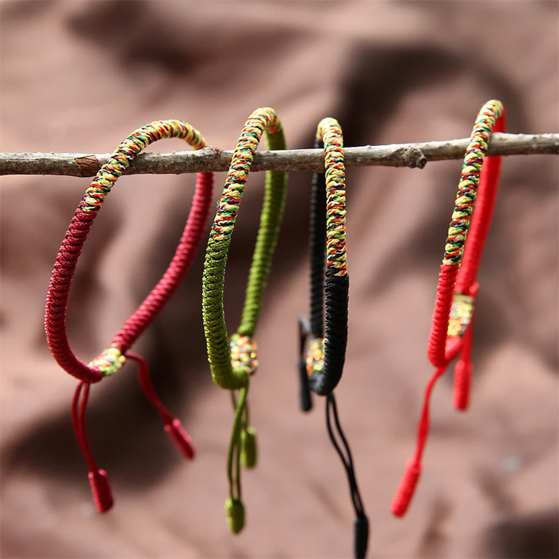 Mehrfarbiges tibetisches King Kong Knoten-Armband mit roter Schnur