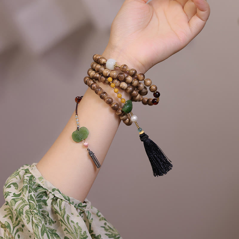 Natürliches Adlerholz-Bernstein-Jade-Armband für Gleichgewicht und Schutz