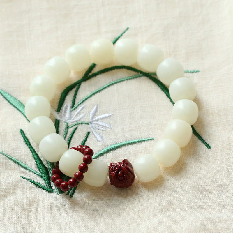 Natürlicher Bodhi-Samen, Zinnober, tanzender Löwe, Charm-Handgelenk-Mala