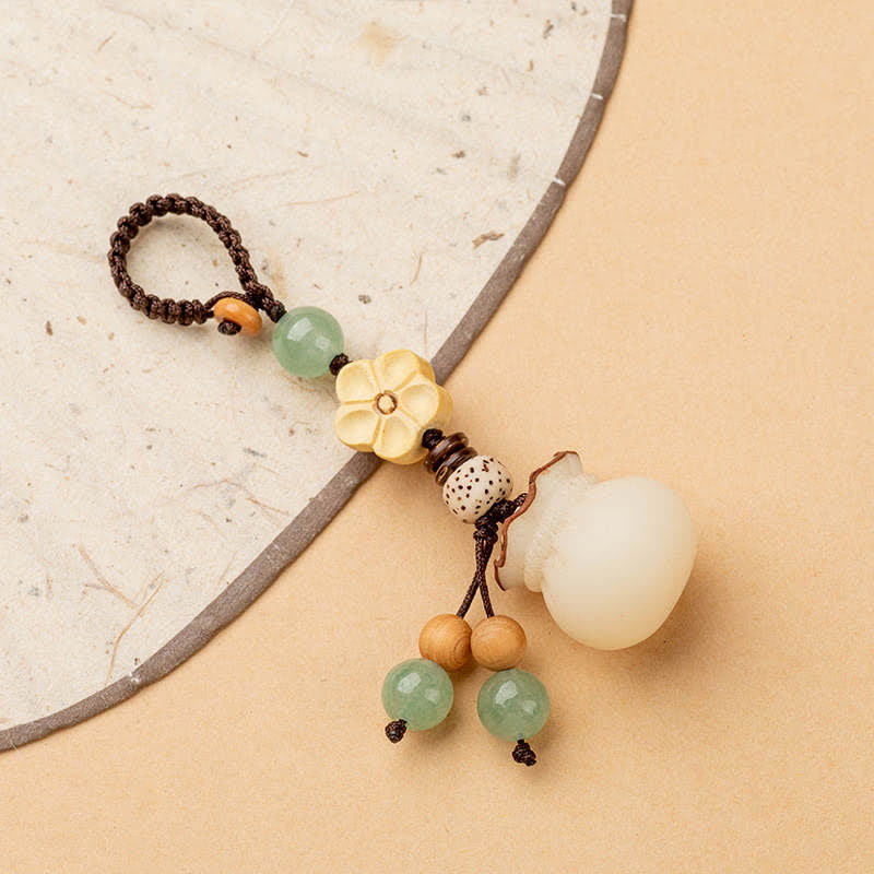 Natürlicher Bodhi-Samen-Schlüsselanhänger mit Wohlstands-Geldbeutel