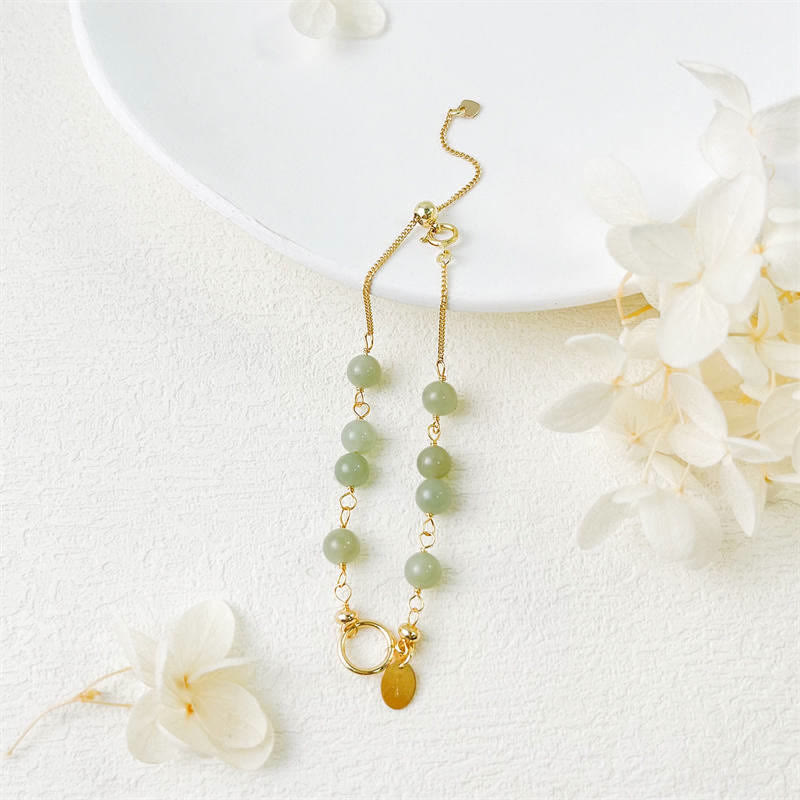 Natürliches Hetian-Jade-Armband aus 14 Karat Gold für Glück und Wohlstand