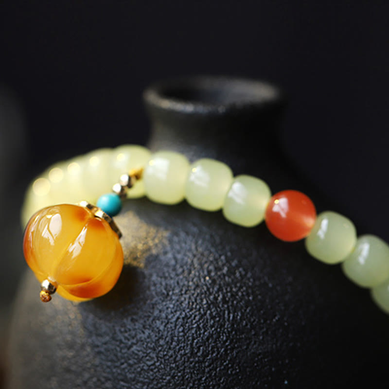 Natürliches Hetian Jade Wohlstandsarmband mit Bernstein und rotem Achat